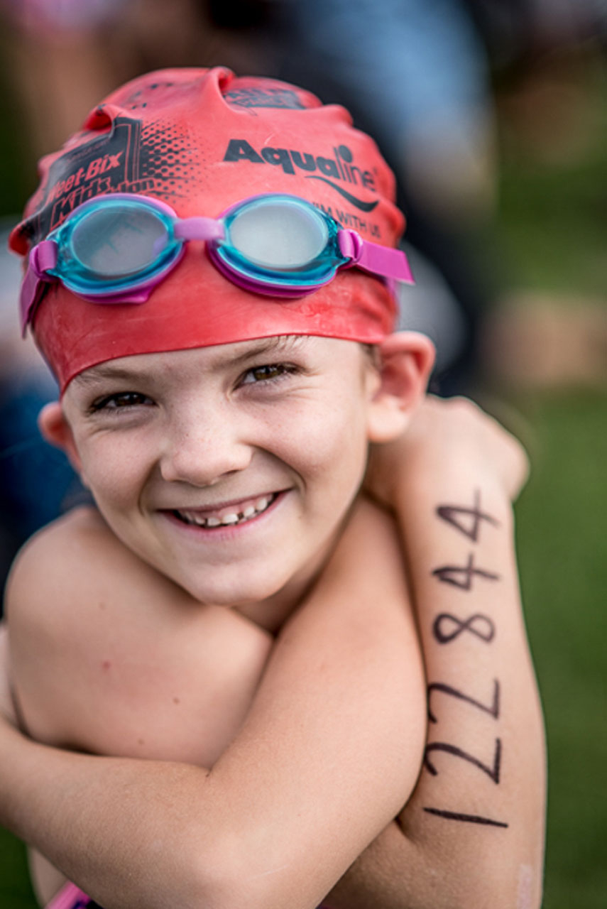 young girl, swim cap and goggles. Weetbix Triathlon day. Nelson